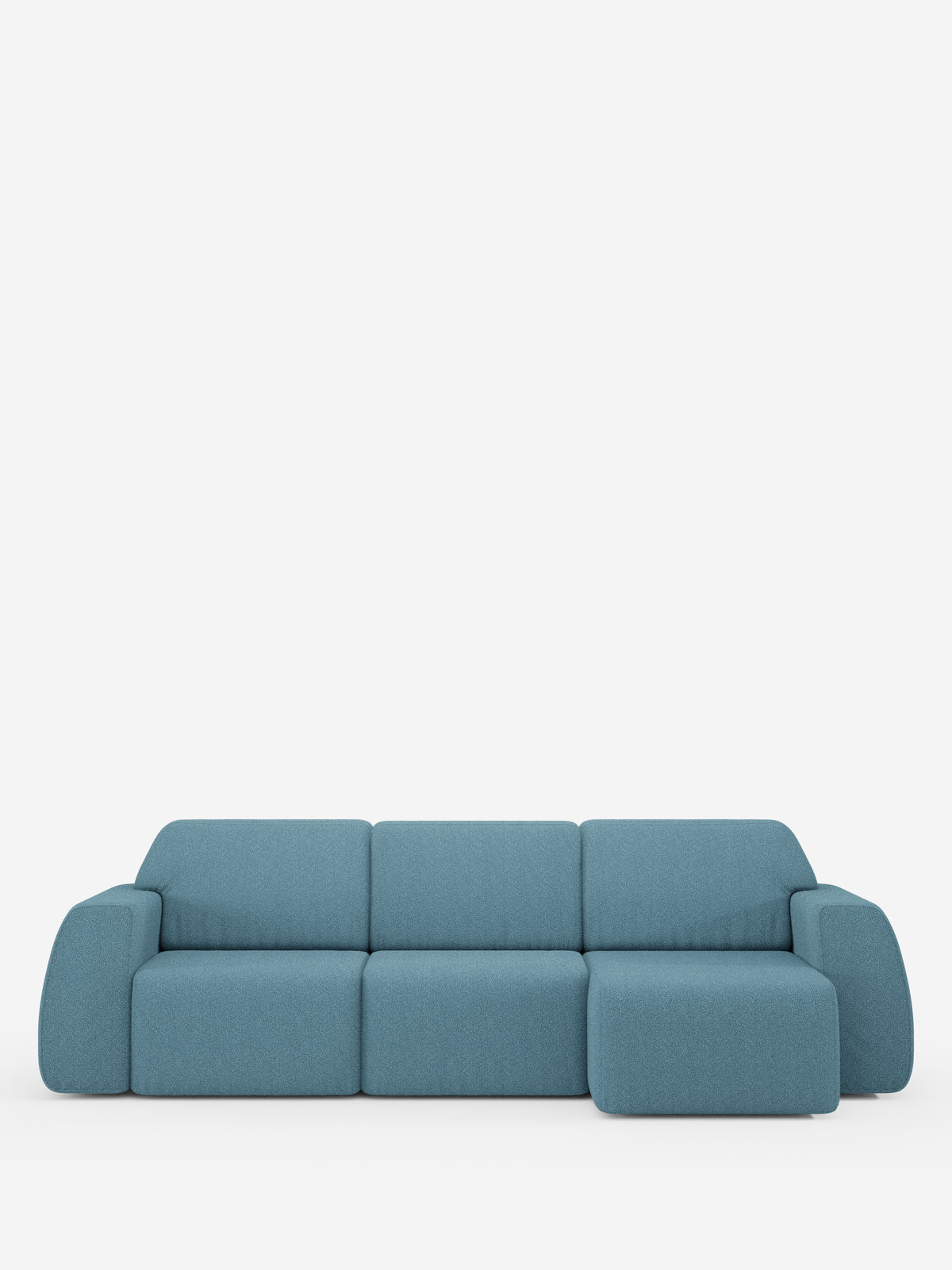 Un moderno divano componibile blu “Orbit” di divitt.sbs, caratterizzato da una chaise longue reversibile e da sedute allungabili. Questo divano di alta gamma presenta morbidi braccioli arrotondati e un design minimalista, realizzato in tessuto effetto cotone antimacchia (T33), qui raffigurato su uno sfondo bianco a tinta unita.