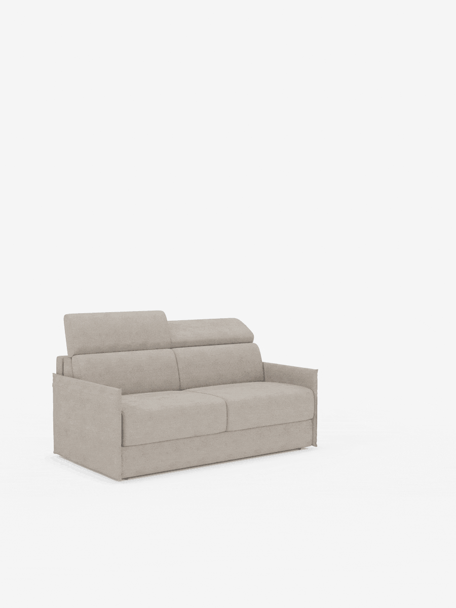 Un divano letto Miryam color beige chiaro con poggiatesta reclinabili e comfort maxi di divitt.sbs, caratterizzato da un design compatto in morbido tessuto smacchiabile T31 e cuscini rettangolari, è posizionato al centro su uno sfondo bianco a tinta unita. Questo lussuoso divano a due posti offre un look pulito e moderno e propone uno stile minimal contemporaneo, privo di motivi o decorazioni visibili.