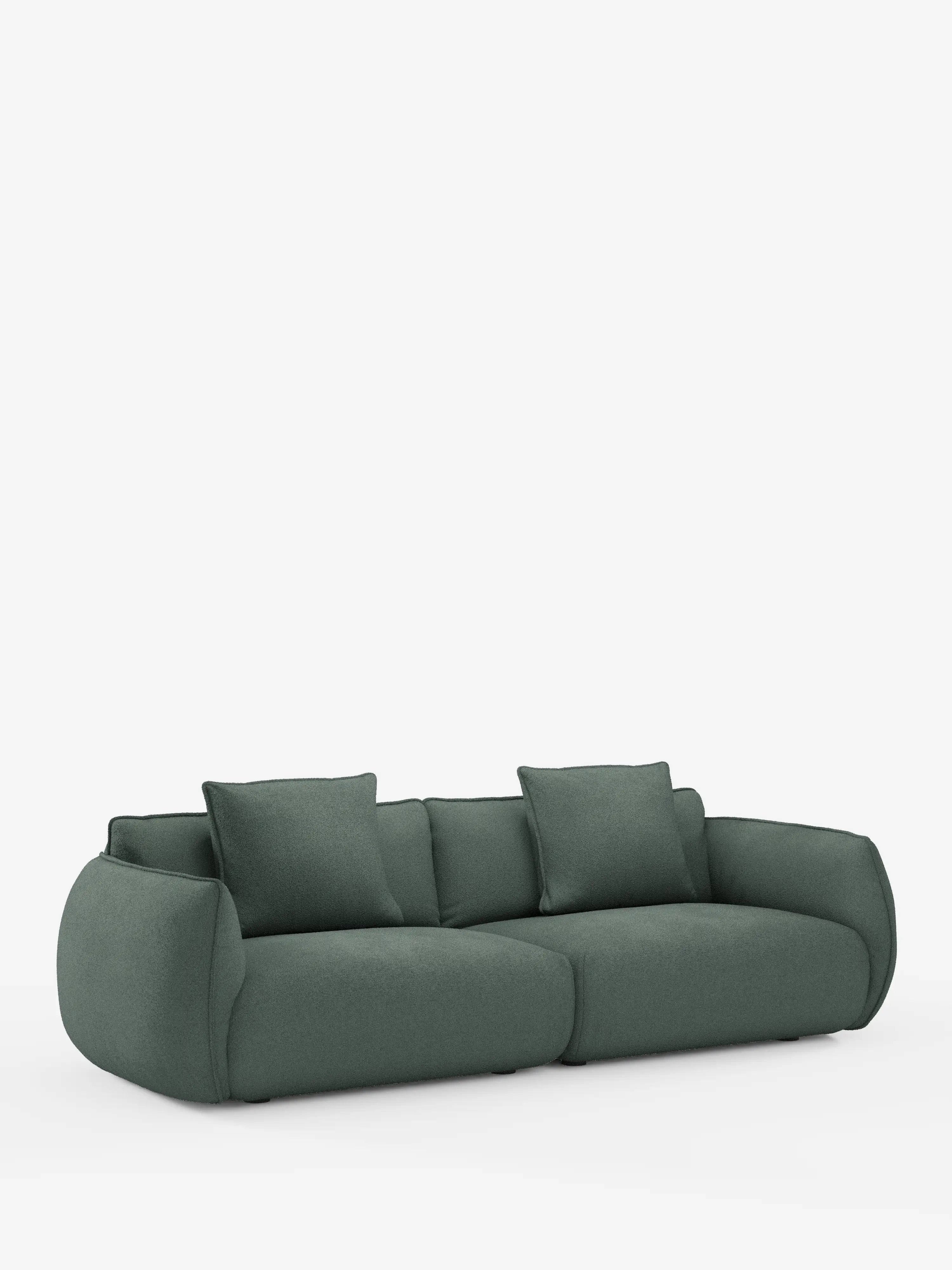 Vi presentiamo il divano Nimbus, un modello modulare e componibile a 3 posti firmato divitt.sbs: un divano contemporaneo di colore verde intenso, lungo 250 cm. Questo elegante divano si caratterizza per il profilo ribassato, i bordi arrotondati e morbidi e gli ampi braccioli. È dotato di tre cuscini di seduta e due cuscini dello schienale coordinati, tutti rivestiti in tessuto effetto cotone t33 sfoderabile e antimacchia, che risaltano su uno sfondo bianco a tinta unita per un look moderno e accogliente.