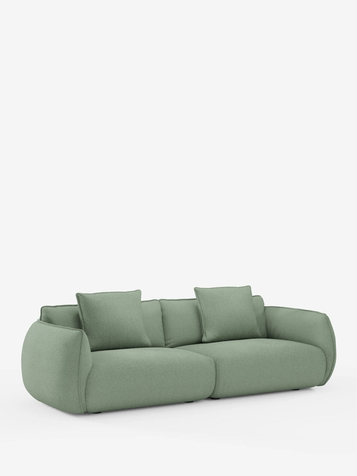 Un “Nimbus divano 3 posti modulare e componibile 250 cm” di divitt.sbs, in stile contemporaneo e di colore verde chiaro, rivestito in tessuto t33 effetto cotone, sfoderabile e antimacchia. Il divano è dotato di due cuscini di seduta, tre cuscini dello schienale e due braccioli laterali, con una silhouette bassa e ampia e bordi arrotondati e morbidi. Sullo sfondo bianco a tinta unita, risalta il design morbido e moderno del divano.