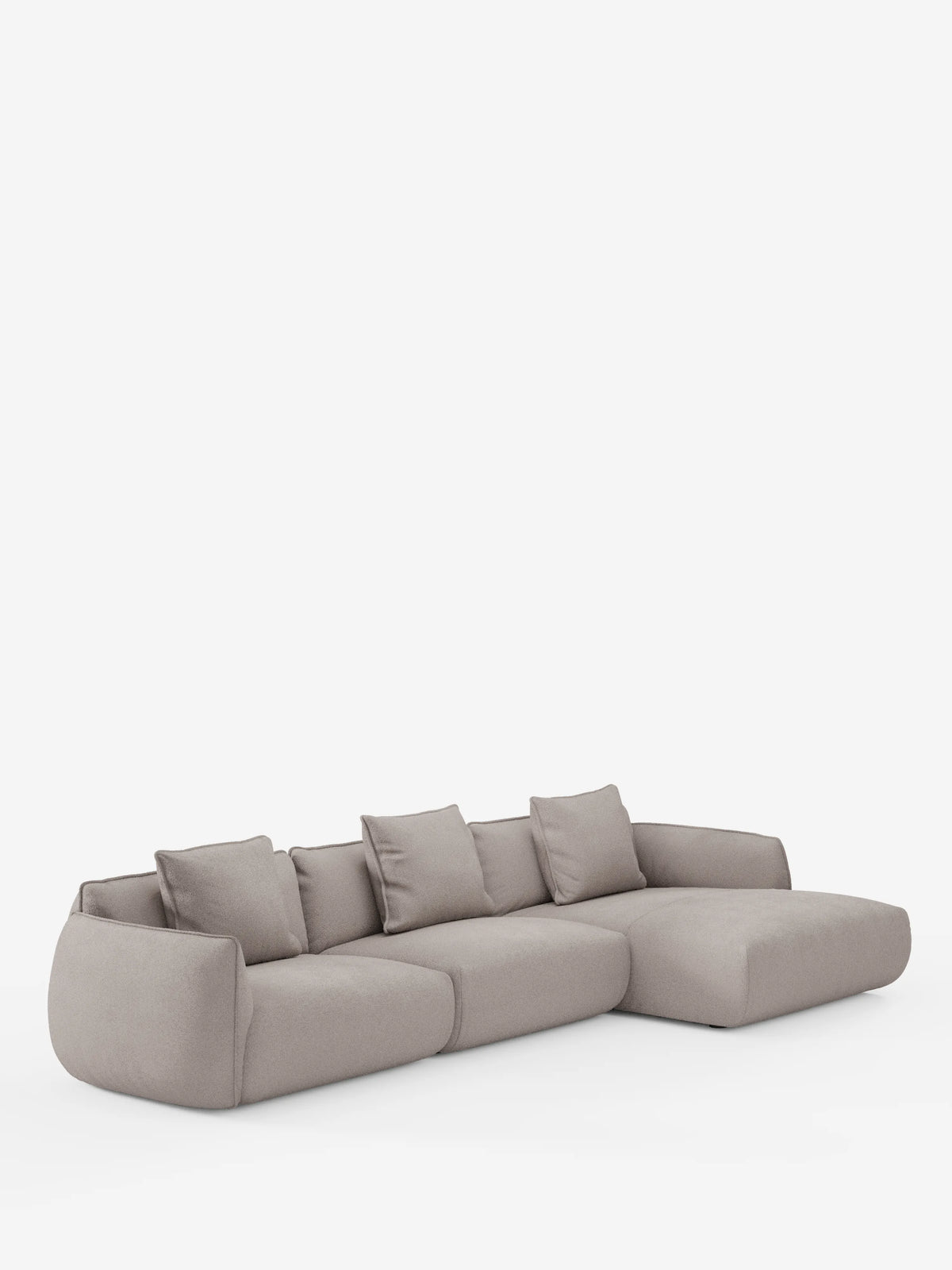 Il divano angolare con penisola componibile Nimbus in morbido tessuto effetto cotone smacchiabile T33 di divitt.sbs è un divano componibile moderno, di colore grigio chiaro, dalle linee morbide e arrotondate. È dotato di quattro cuscini dello schienale e di una chaise longue sul lato destro. Il rivestimento sfoderabile è liscio e antimacchia, con una finitura effetto cotone, mentre il design minimalista risalta sullo sfondo bianco a tinta unita.