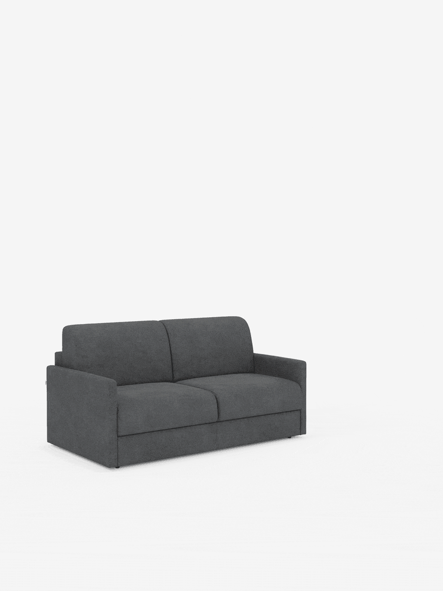 Un divano letto Tommy Divano a 2 e 3 posti matrimoniale, in grigio scuro e dal design moderno, di divitt.sbs, è posizionato al centro su uno sfondo bianco. Caratterizzato da linee rette e braccioli bassi, questo divano compatto è rivestito in tessuto T33, morbido, lussuoso, sfoderabile e resistente alle macchie, che ricorda il cotone. Non sono presenti decorazioni aggiuntive, cuscini né gambe visibili sotto il divano.