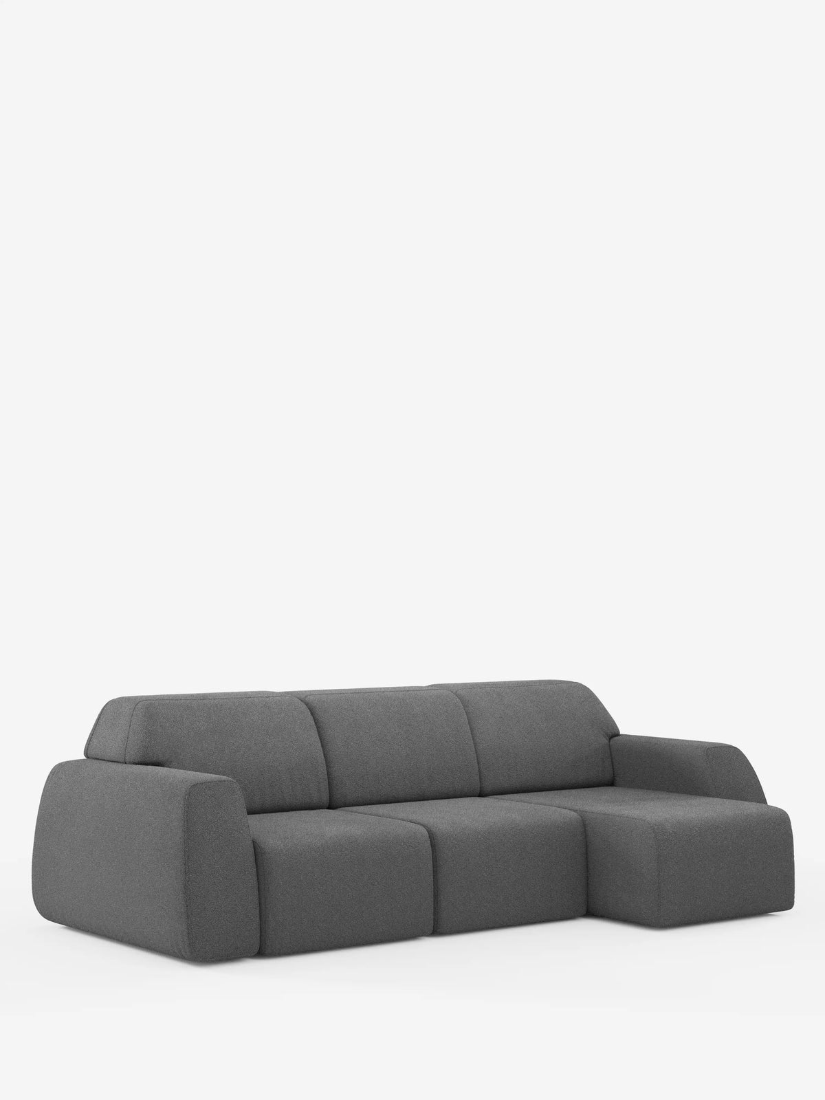 Il divano angolare divitt.sbs Orbit con penisola reversibile e tutte le sedute allungabili in tessuto smacchiabile effetto cotone T33 è un moderno divano a tre posti in tessuto grigio scuro, caratterizzato da braccioli arrotondati, tre sedute imbottite e una chaise longue sul lato destro. Questo divano angolare reversibile si caratterizza per il profilo ribassato, l’assenza di gambe a vista e un design minimalista su sfondo bianco.