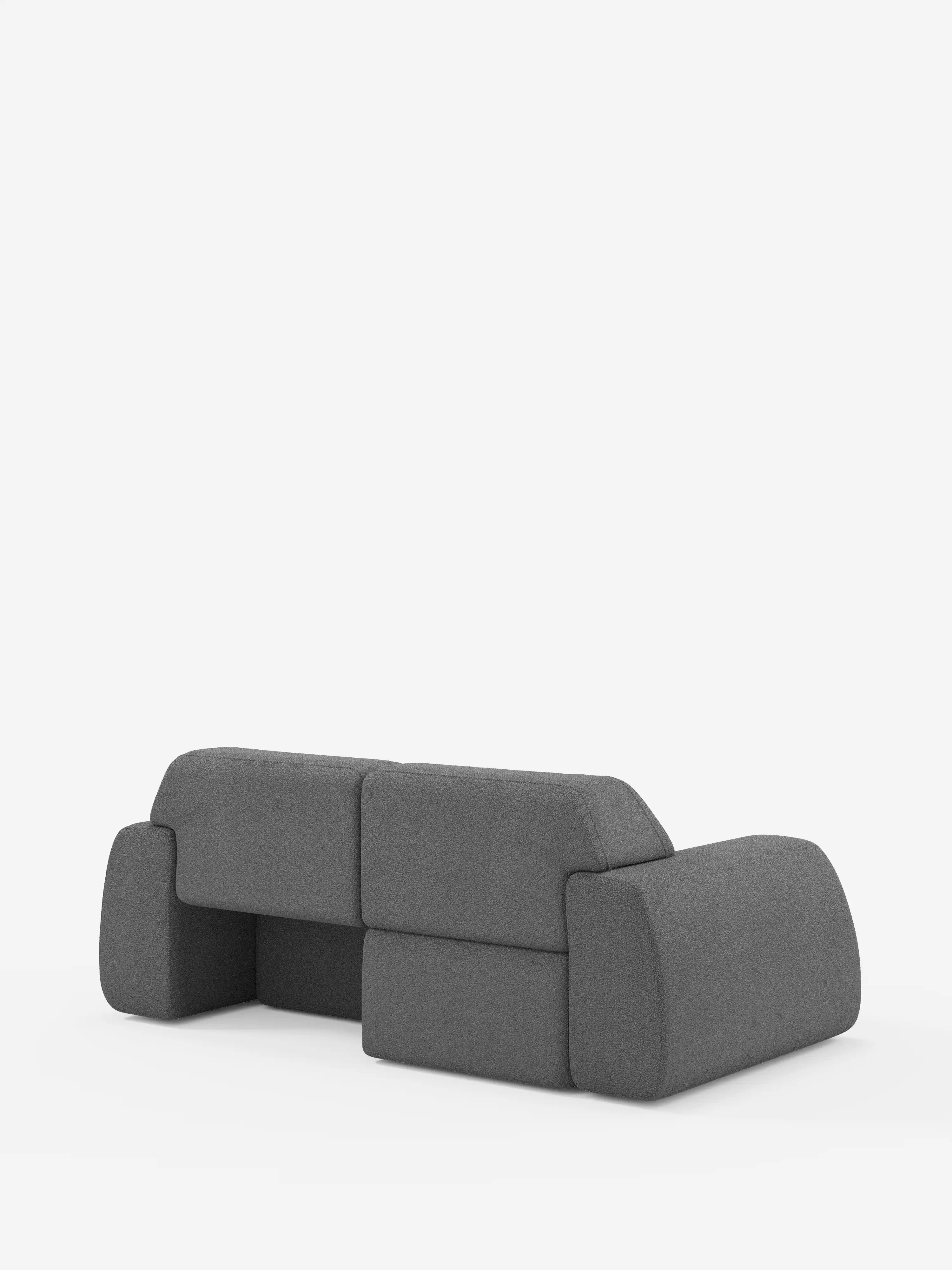 Un divano moderno e modulare di colore grigio di divitt.sbs — il divano Orbit a 2 e 3 posti con sedute scorrevoli — si caratterizza per i cuscini spessi e arrotondati e per un look minimalista con schienale e braccioli bassi. Interamente sfoderabile, è rivestito in tessuto T33 effetto cotone antimacchia e si distingue su uno sfondo bianco a tinta unita, per un design pulito e contemporaneo.