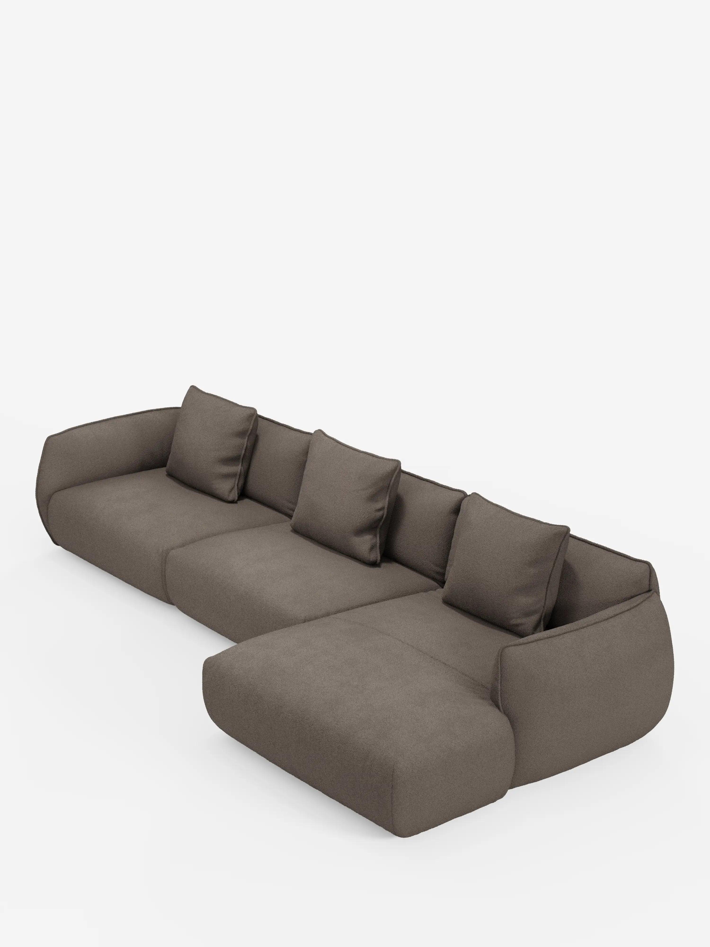 Un divano angolare componibile Nimbus dal profilo basso e moderno con penisola, firmato divitt.sbs, rivestito in tessuto T33 smacchiabile grigio scuro effetto cotone. Dotato di quattro cuscini di seduta, cinque cuscini dello schienale abbinati e braccioli arrotondati, la chaise longue si estende nella parte anteriore destra. Questo divano moderno è esposto su uno sfondo bianco a tinta unita.