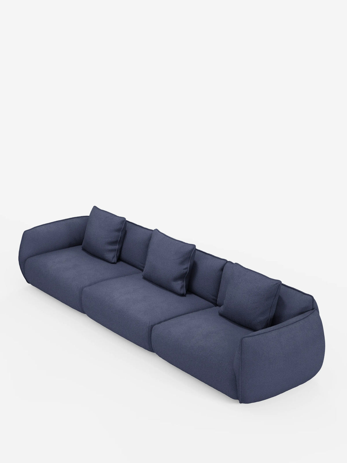 Un divano modulare contemporaneo Nimbus blu navy a 3 posti di divitt.sbs, rivestito in morbido tessuto T33 effetto cotone, resistente alle macchie. Questo divano moderno è caratterizzato da cuscini coordinati, un profilo basso, bordi arrotondati e una silhouette minimalista, il tutto su uno sfondo bianco a tinta unita.