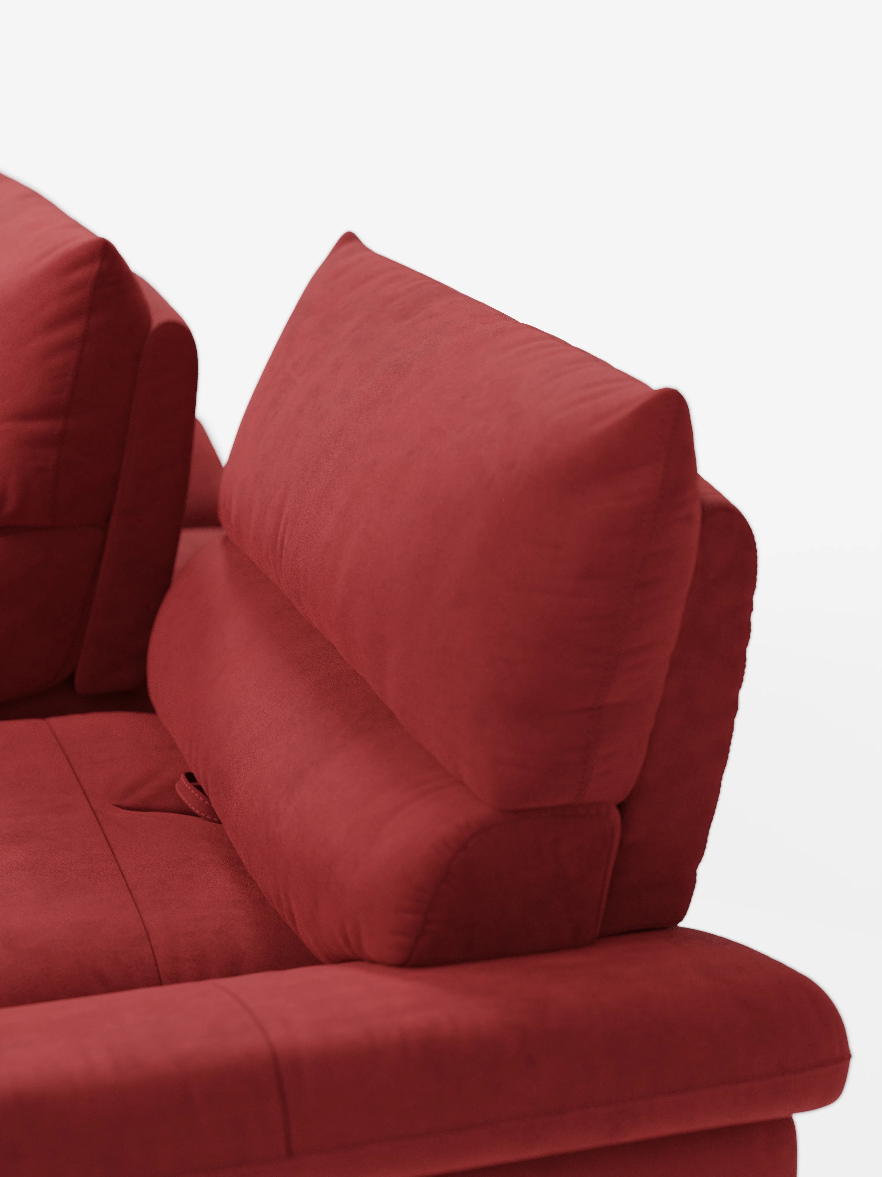 Un primo piano dell’Eclipse Divano, dal design moderno, a 2 e 3 posti con schienali traslanti, di divitt.sbs, rivestito in rosso e dotato di morbidi cuscini con schienali regolabili. La morbida ed elegante microfibra T11 resistente alle macchie esalta il suo design minimalista dalle linee pulite, mentre gli eleganti piedini alti in metallo aggiungono un tocco di modernità, il tutto su uno sfondo bianco a tinta unita.