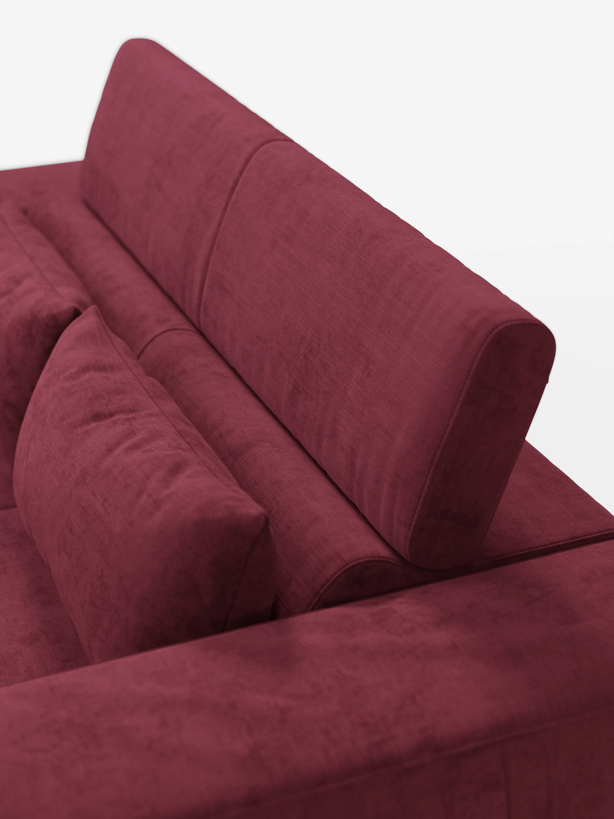 Un primo piano del divano Monarch con relax elettrico di divitt.sbs ne mette in risalto la silhouette elegante e moderna in un intenso color bordeaux. L'immagine mette in risalto lo schienale regolabile, il poggiatesta reclinabile e un unico morbido cuscino, tutti rivestiti in morbido tessuto T31 resistente alle macchie. Sullo sfondo bianco a tinta unita, l'attenzione è tutta rivolta al colore raffinato e alle linee eleganti del divano.