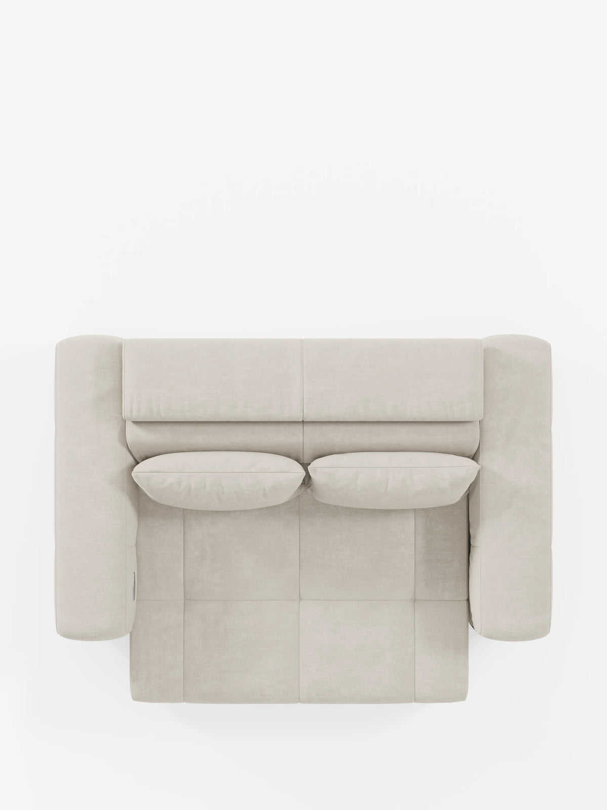 Vista dall'alto del divano Monarch con funzione relax elettrica per l'allungamento delle sedute e poggiatesta reclinabile, realizzato in morbido tessuto smacchiabile T31 di divitt.sbs, qui raffigurato in beige chiaro. Questo divano dal design moderno e contemporaneo presenta braccioli squadrati e due cuscini coordinati. Su uno sfondo bianco, i cuscini della seduta e dello schienale presentano cuciture a vista che contribuiscono a creare un look pulito e simmetrico.