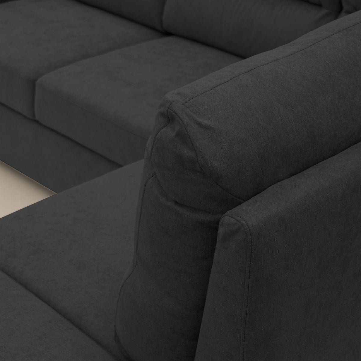Minerva divano angolare con estraibile a cassettone e pouf contenitore in tessuto morbido impermeabile T02 nero - divitt.sbs