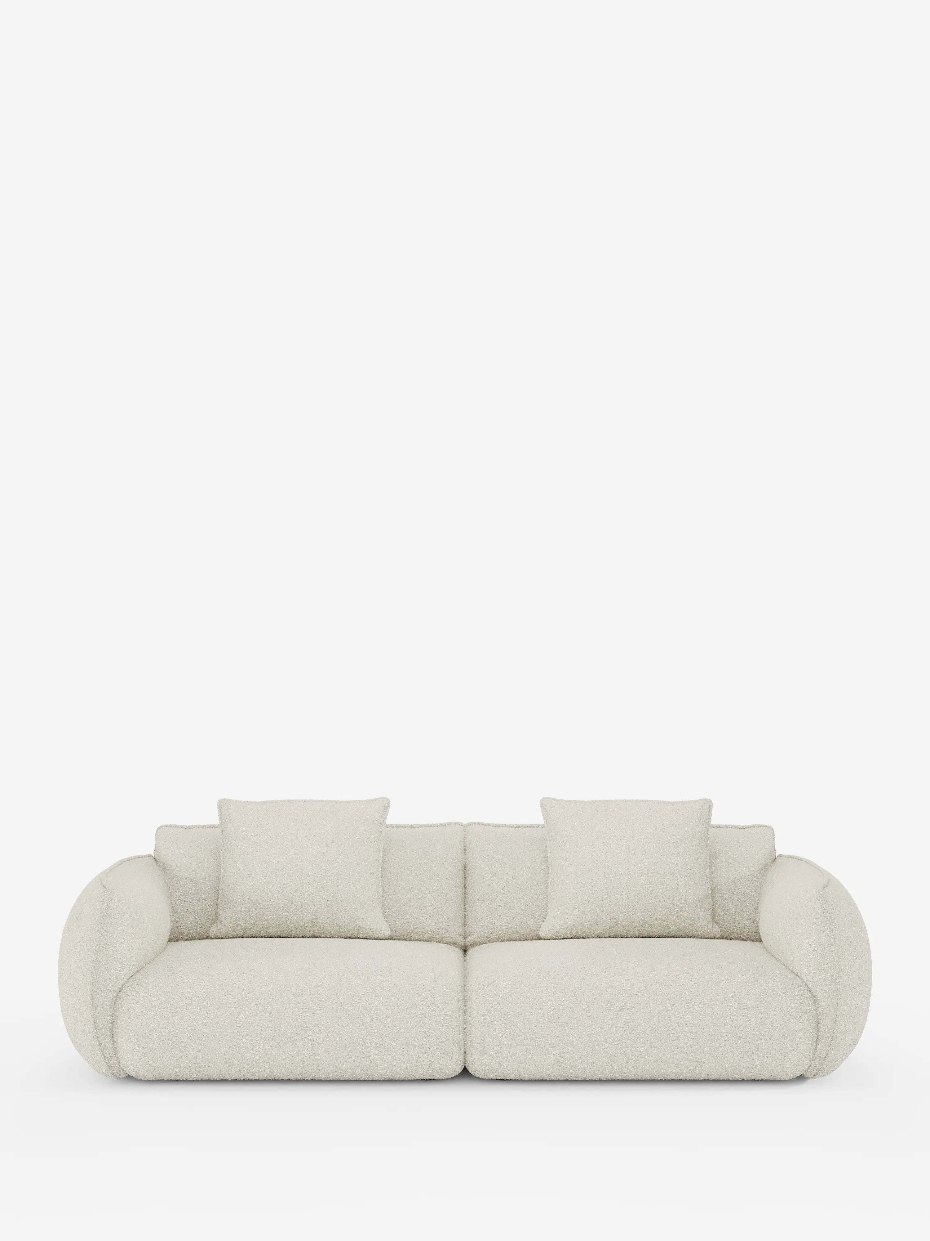 Vi presentiamo il divano Nimbus, un modello modulare e componibile a 3 posti di divitt.sbs: un divano moderno e minimalista in beige chiaro, con braccioli arrotondati e due cuscini di seduta. Questo divano modulare da 250 cm è rivestito in tessuto effetto cotone (T33) sfoderabile e resistente alle macchie, include due cuscini quadrati coordinati per lo schienale ed è presentato su uno sfondo bianco a tinta unita per un’estetica pulita e contemporanea.