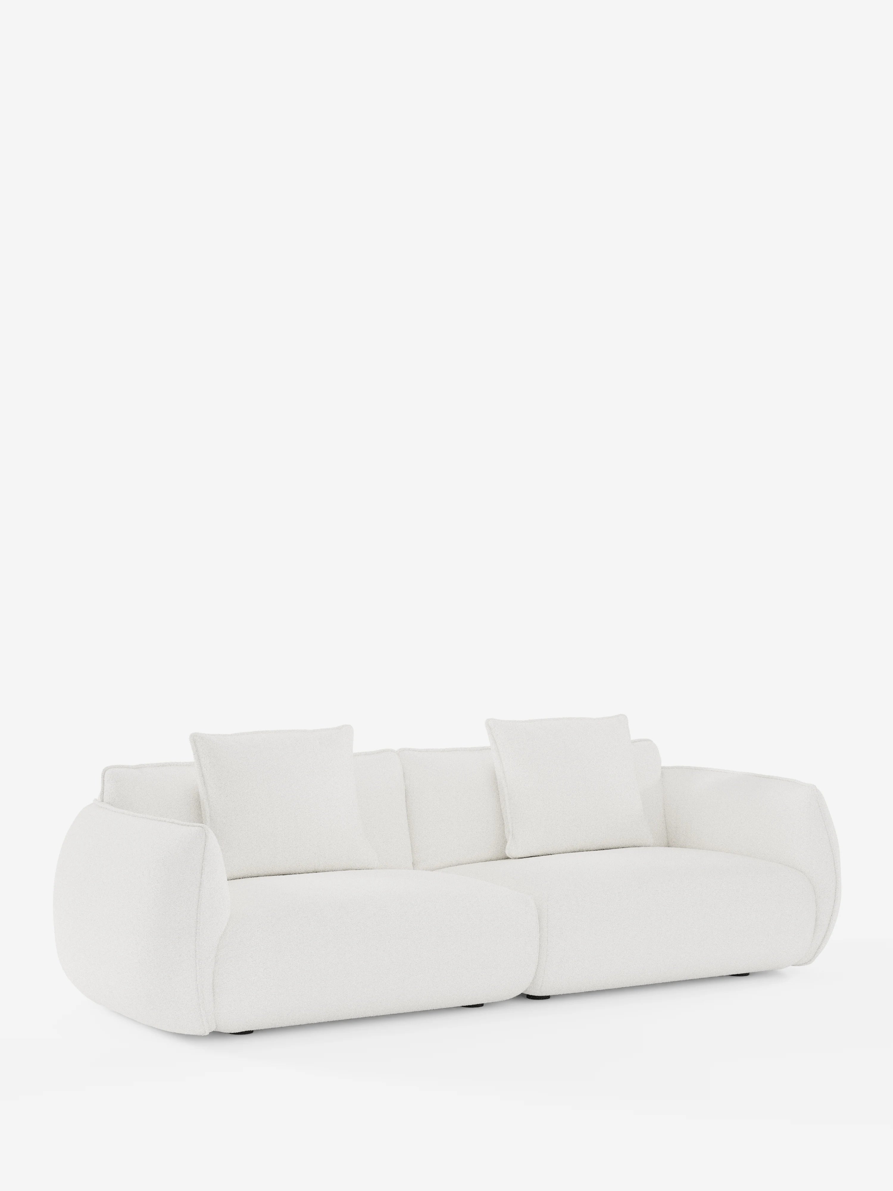 Il divano modulare a 3 posti Nimbus di divitt.sbs presenta un design moderno in bianco, con bordi arrotondati e morbidi e una silhouette dal profilo basso. Con una lunghezza di 250 cm, questo divano comprende due cuscini di seduta e quattro cuscini schienali quadrati abbinati, tutti rivestiti in tessuto sfoderabile con effetto cotone testurizzato e resistente alle macchie (t33). Presentato su uno sfondo bianco a tinta unita, ne viene esaltata l’estetica minimalista e contemporanea.