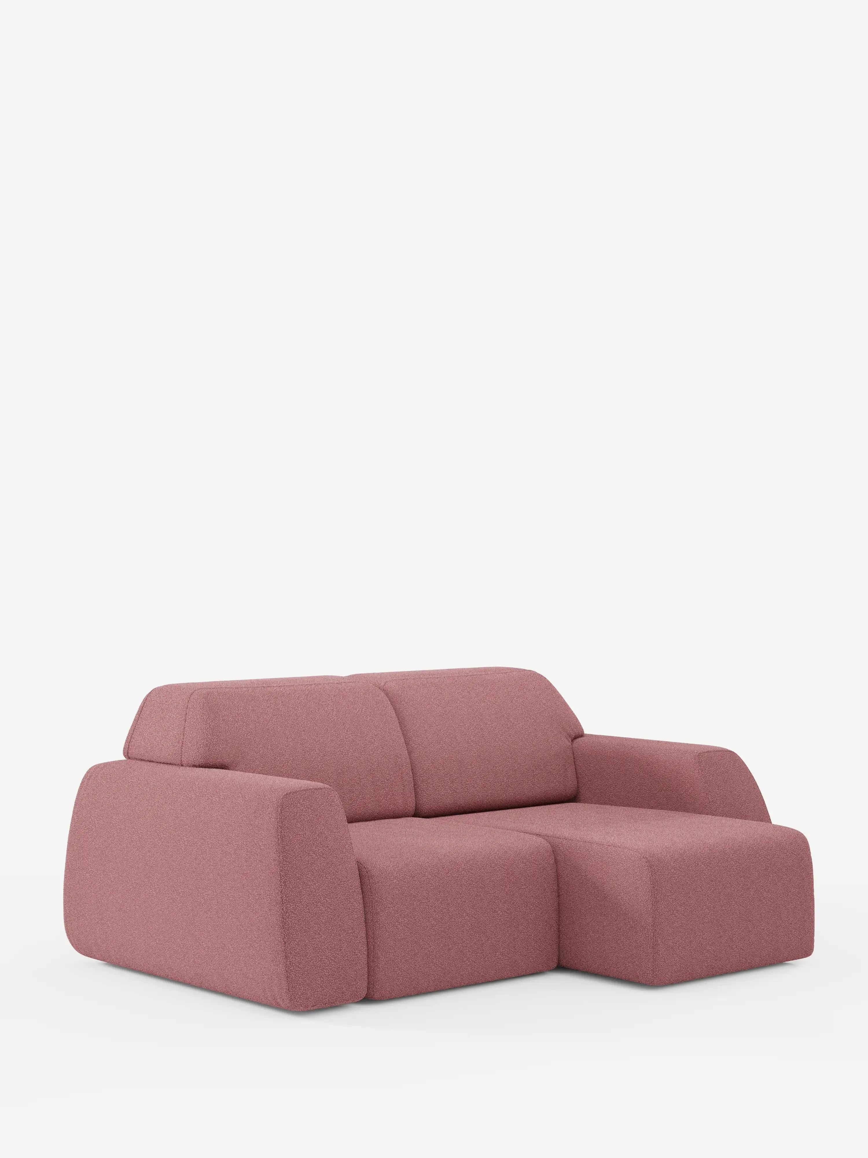Il divano Orbit a 2 e 3 posti con sedute scorrevoli di divitt.sbs è un divano componibile moderno e minimalista, interamente rivestito in tessuto T33 effetto cotone, facile da pulire, in una tonalità di rosa tenue. È caratterizzato da ampi braccioli arrotondati, imbottitura morbida e una chaise longue sul lato destro con elementi di design contemporaneo, il tutto su uno sfondo bianco a tinta unita.