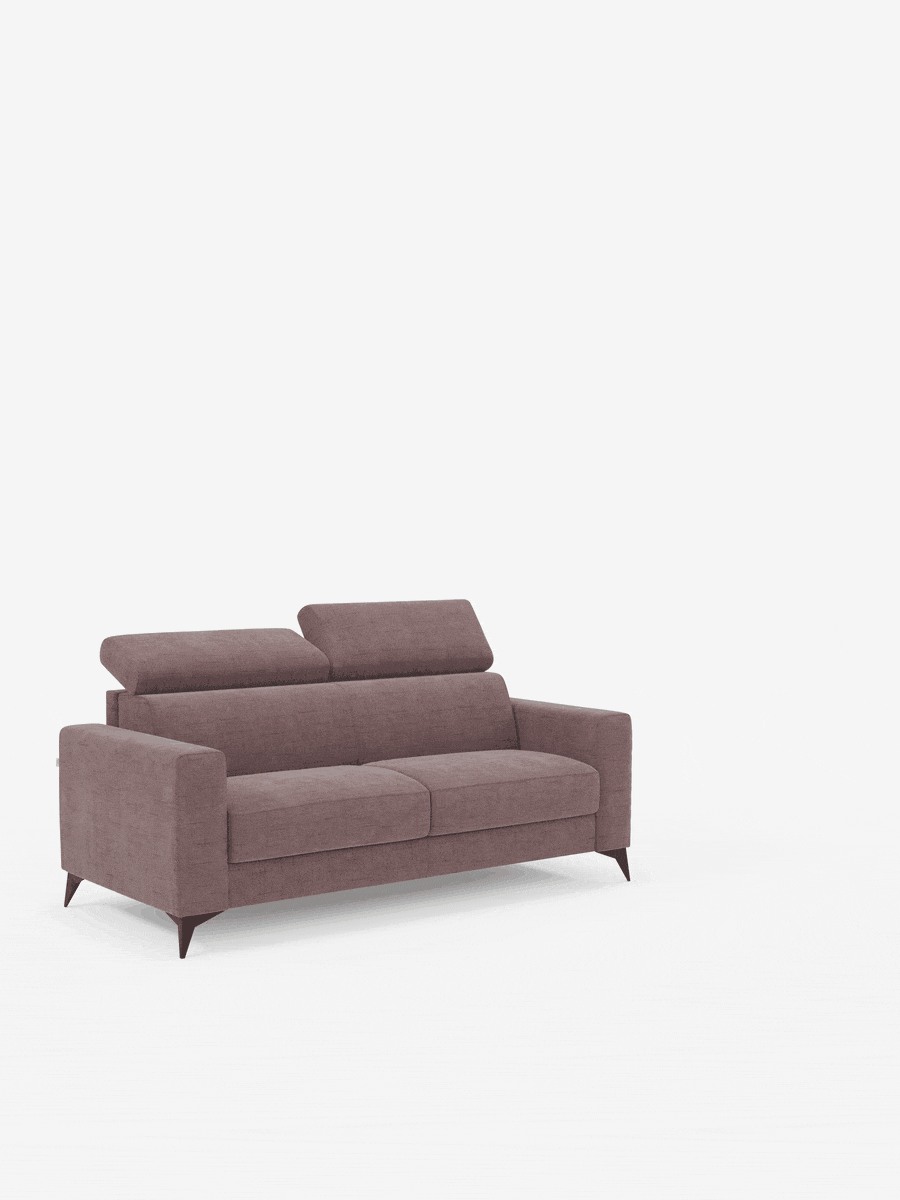 Un moderno divano letto matrimoniale Pegaso di divitt.sbs, rivestito in tessuto jacquard color malva resistente alle macchie (T22), è dotato di poggiatesta regolabili e gambe angolate in legno. Il design minimalista, caratterizzato da linee pulite e due cuscini di seduta, è messo in risalto su un pavimento bianco davanti a uno sfondo bianco uniforme, creando una scena luminosa e ordinata.