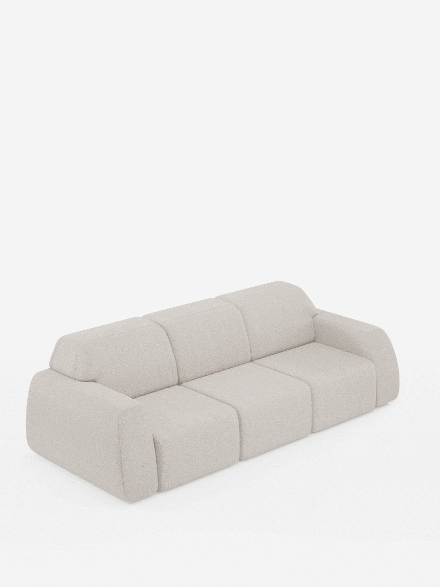 Un divano moderno e lussuoso color beige — il modello Orbit con 3 sedute scorrevoli e allungabili in tessuto effetto cotone smacchiabile T33 di divitt.sbs — presenta tre sedute regolabili e allungabili in modo indipendente, ampi braccioli e una silhouette minimalista con bordi arrotondati che risaltano su uno sfondo bianco a tinta unita. Il suo rivestimento completamente sfoderabile in tessuto effetto cotone antimacchia garantisce sia una manutenzione semplice che flessibilità per gli spazi abitativi