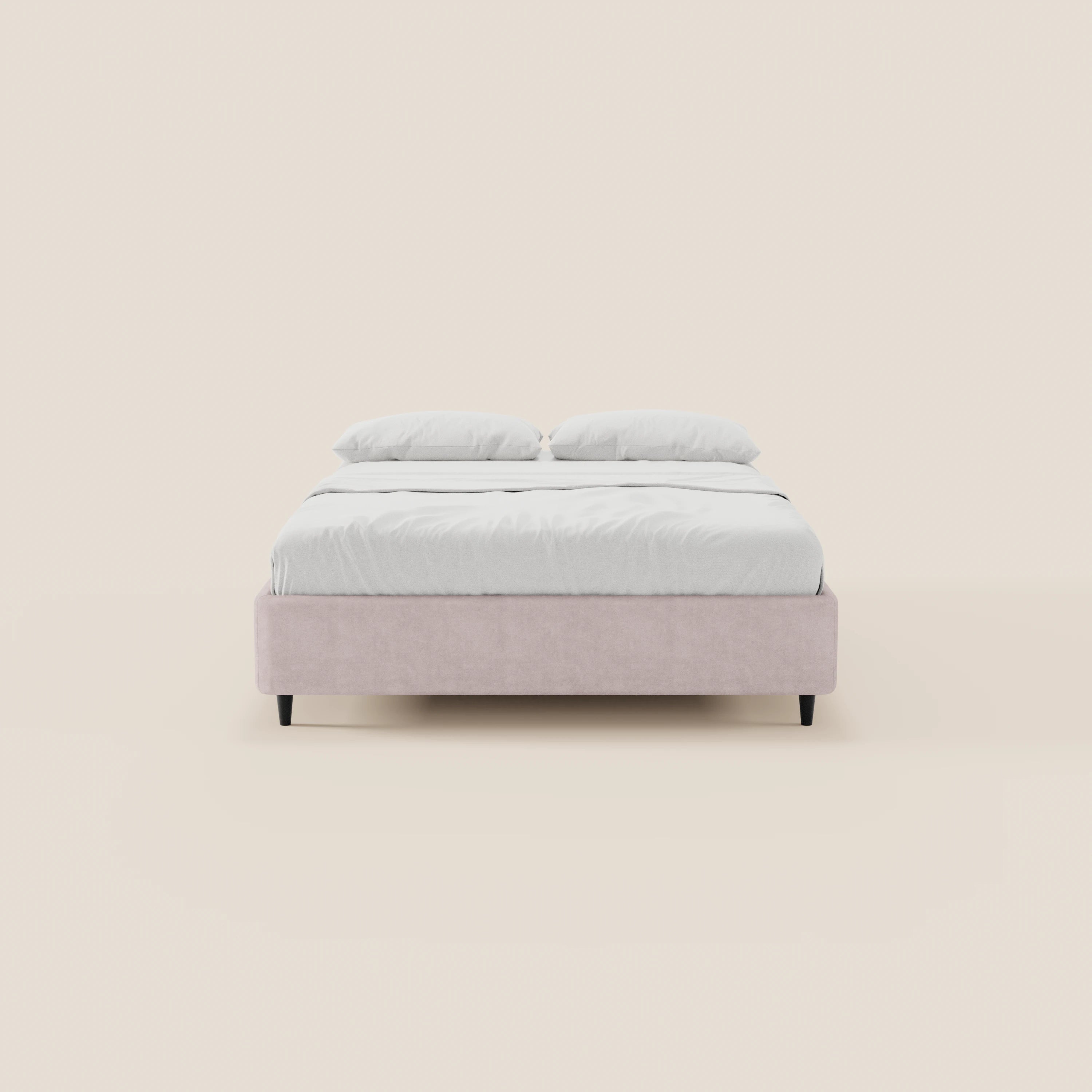 Il letto sommier imbottito ERON di Letti.store è raffigurato di fronte, rivestito in tessuto impermeabile Oeko-Tex rosa pallido, con biancheria da letto bianca e due cuscini bianchi. Questo elegante letto non presenta testiera visibile né elementi decorativi aggiuntivi.