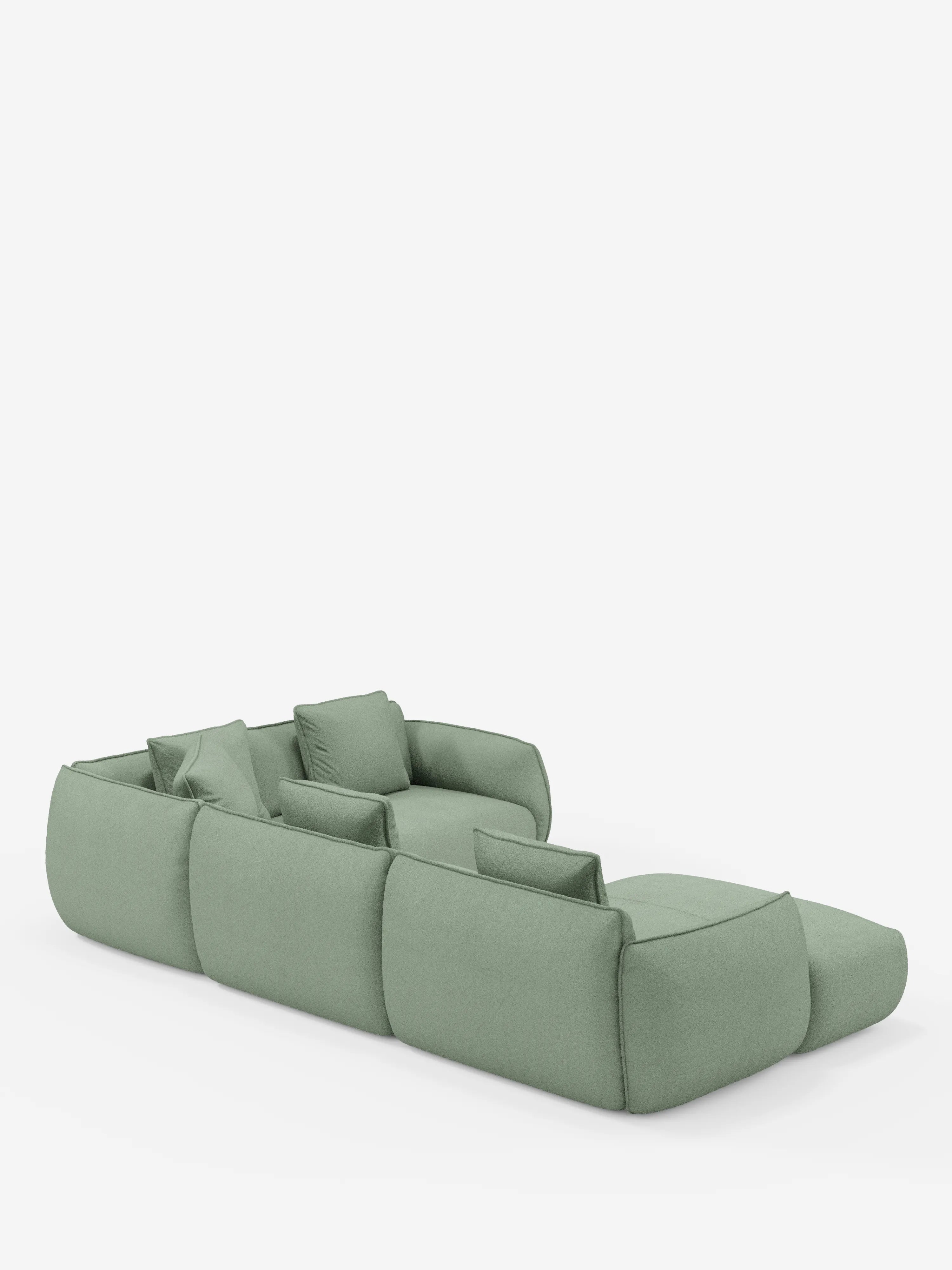Divano angolare panoramico modulare a tre posti Nimbus con penisola e angolo, rivestito in tessuto verde chiaro resistente alle macchie (t33), di divitt.sbs. Questo divano Made in Italy presenta bordi arrotondati e cuscini coordinati, qui raffigurato in una prospettiva posteriore. Su uno sfondo bianco a tinta unita, il suo design senza gambe a vista gli conferisce un aspetto discreto e contemporaneo.
