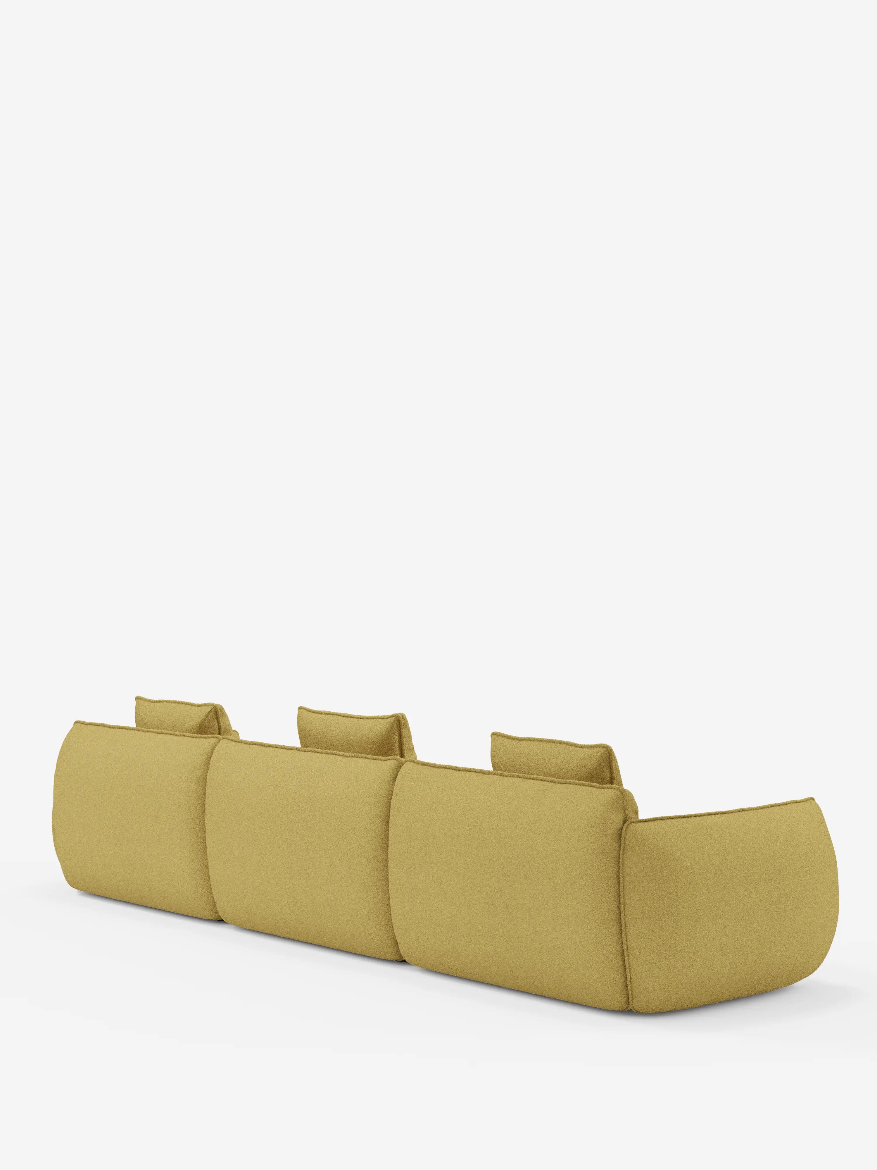 Un divano modulare contemporaneo Nimbus a 3 posti di divitt.sbs, color giallo senape, rivestito in morbido tessuto T33 effetto cotone resistente alle macchie, è ripreso di retro su uno sfondo bianco. Il divano presenta cuscini dello schienale fissi e gambe non visibili, conferendogli un aspetto morbido e minimalista.