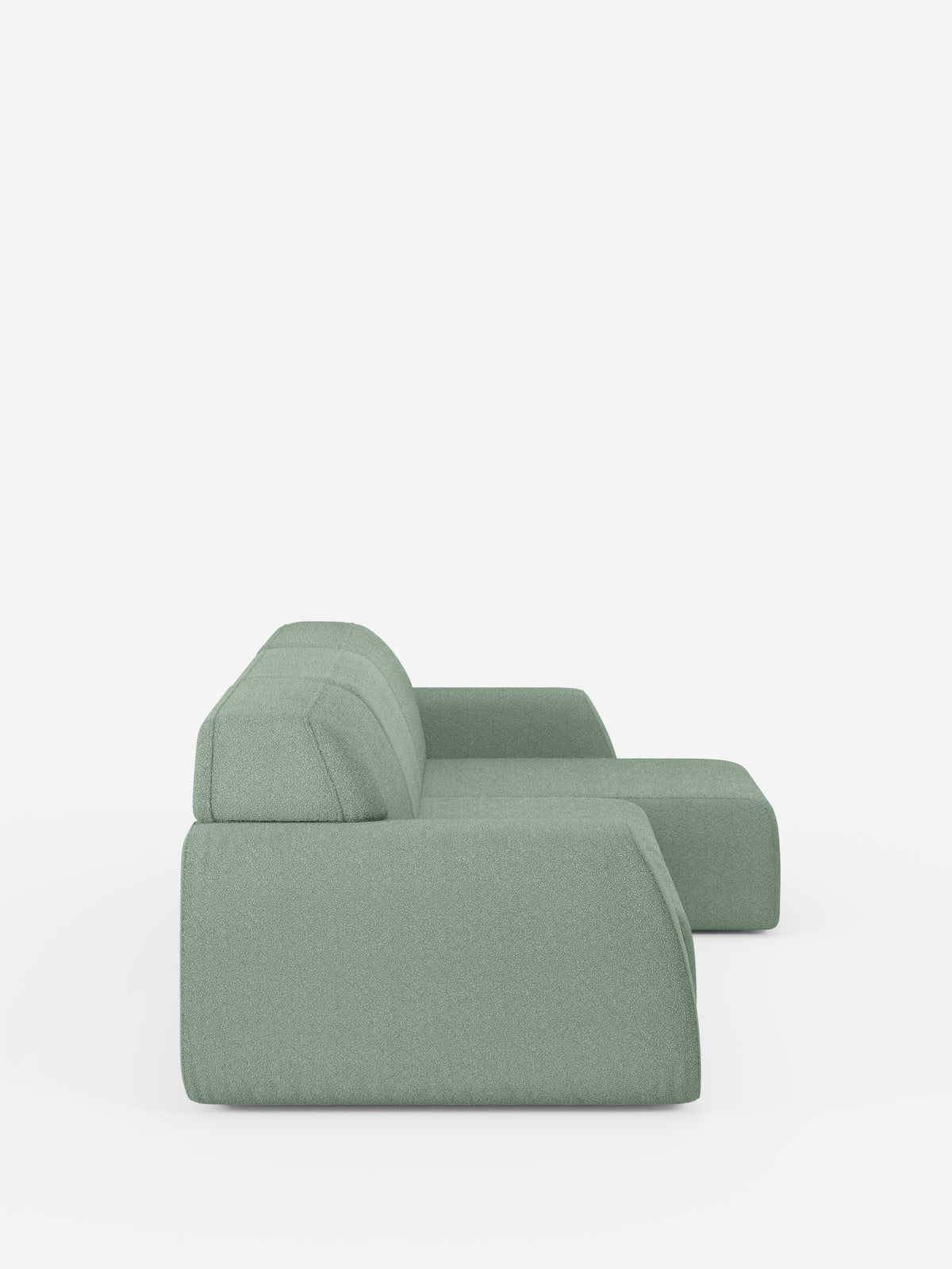Un divano angolare Orbit moderno e minimalista, di colore verde, con penisola reversibile e tutte le sedute allungabili, rivestito in tessuto smacchiabile effetto cotone T33 di divitt.sbs, caratterizzato da uno schienale basso e da cuscini di seduta ampi e profondi. Visto di profilo su uno sfondo bianco a tinta unita, questo divano modulare mette in risalto le sue linee pulite e il morbido rivestimento ant macchia con effetto cotone.