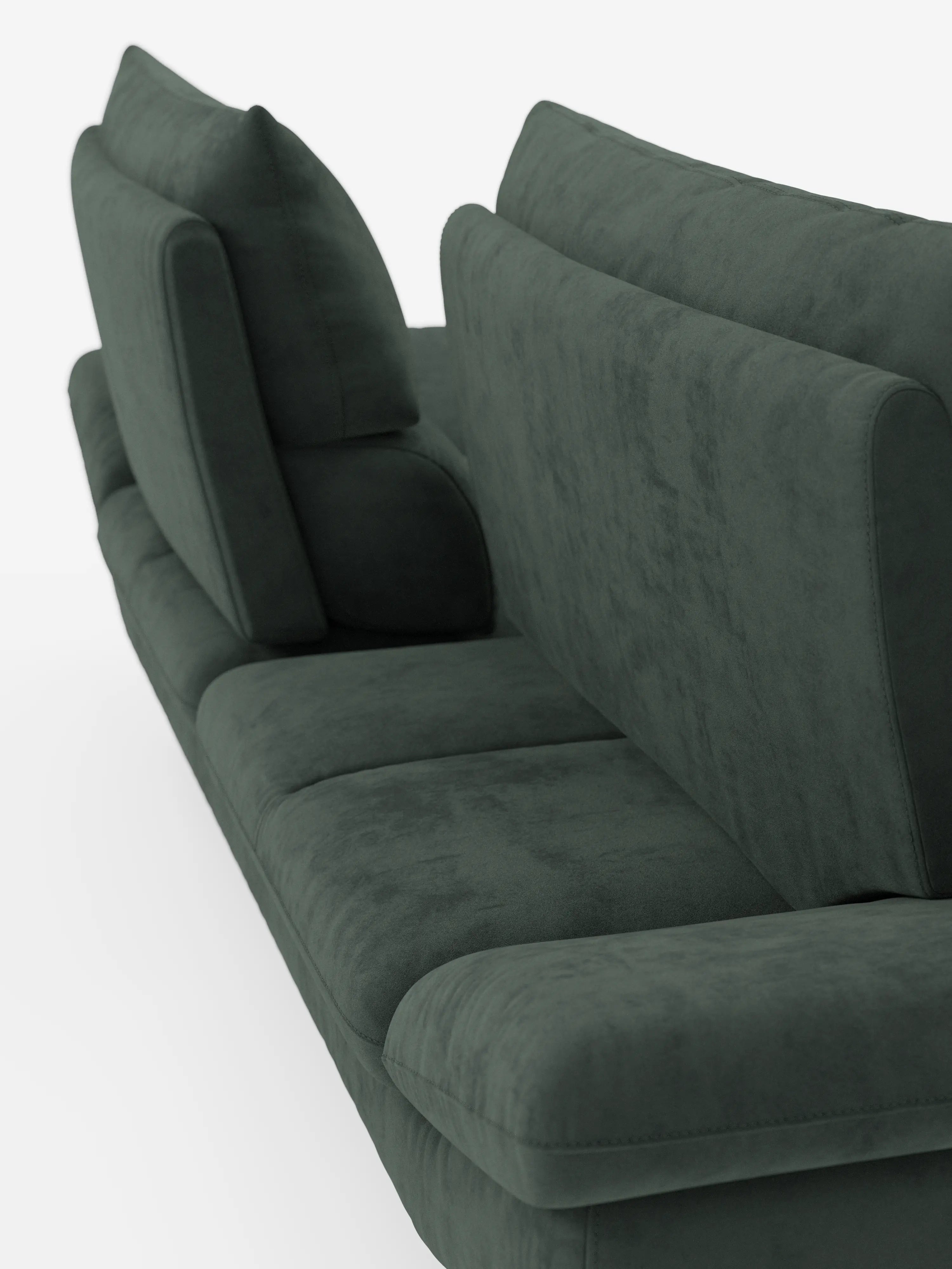 Un primo piano dell’Eclipse Divano dal design moderno a 2 e 3 posti di divitt.sbs, rivestito in elegante microfibra T11 resistente alle macchie, in una tonalità di verde intenso. Il divano è caratterizzato da morbidi cuscini profondi, gambe alte e schienali inclinati con schienali traslanti per un comfort modulabile e un relax personalizzato. La sua silhouette geometrica risalta sullo sfondo bianco a tinta unita, sottolineandone sia lo stile contemporaneo che la texture accogliente.