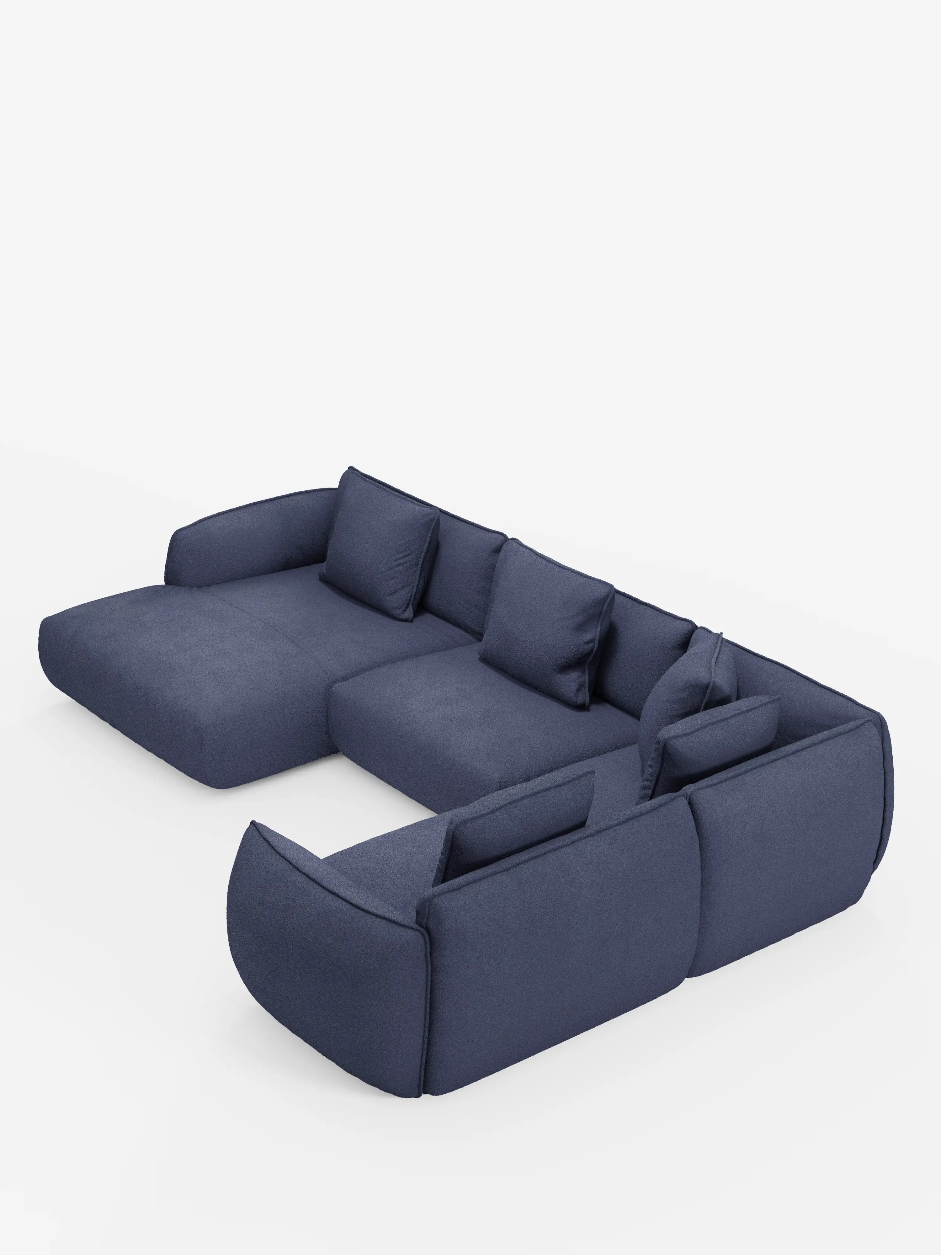 Vi presentiamo il divano angolare panoramico componibile con penisola e angolo in tessuto smacchiabile T33 di divitt.sbs: un divano componibile spazioso e moderno, rivestito in tessuto blu navy facile da pulire. Caratterizzato da bordi bassi e arrotondati, morbidi cuscini di seduta e cinque cuscini decorativi abbinati, questo capolavoro a forma di L incarna il design contemporaneo minimalista e l’eccellente artigianato Made in Italy, splendidamente messo in risalto su uno sfondo bianco a tinta unita.