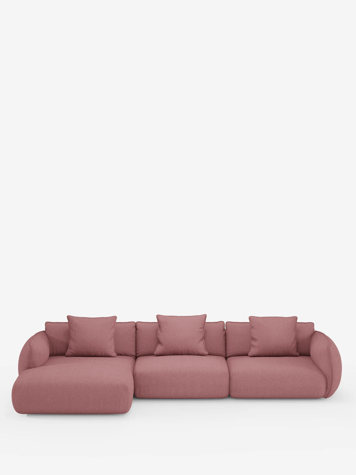 Il divano angolare con penisola componibile Nimbus di divitt.sbs è un moderno divano a tre posti in rosa tenue, rivestito in morbido tessuto T33 effetto cotone resistente alle macchie. Caratterizzato da braccioli e schienali arrotondati, oltre a quattro cuscini quadrati coordinati, questo divano contemporaneo presenta il sedile più a sinistra che si estende verso l’esterno in stile chaise longue, il tutto su uno sfondo bianco a tinta unita.