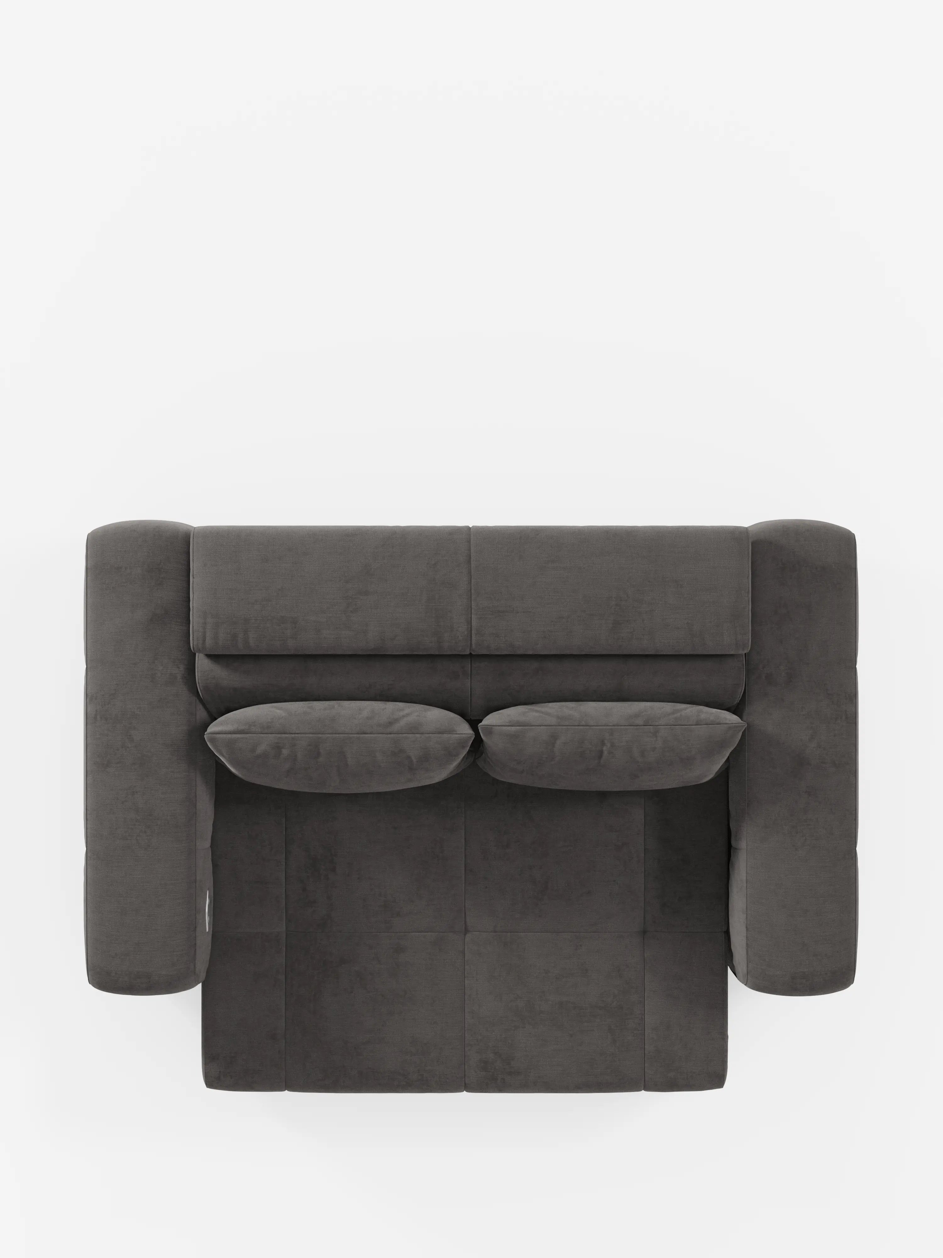 Vista dall'alto di un divano Monarch moderno, color grigio scuro, con funzione Relax Elettrico per l'allungamento delle sedute e poggiatesta reclinabile, realizzato in morbido tessuto smacchiabile T31 di divitt.sbs, con due cuscini coordinati. Questo elegante divano presenta linee pulite e braccioli spessi dal design minimalista che risaltano sullo sfondo bianco. I cuscini della seduta e dello schienale sono perfettamente allineati.