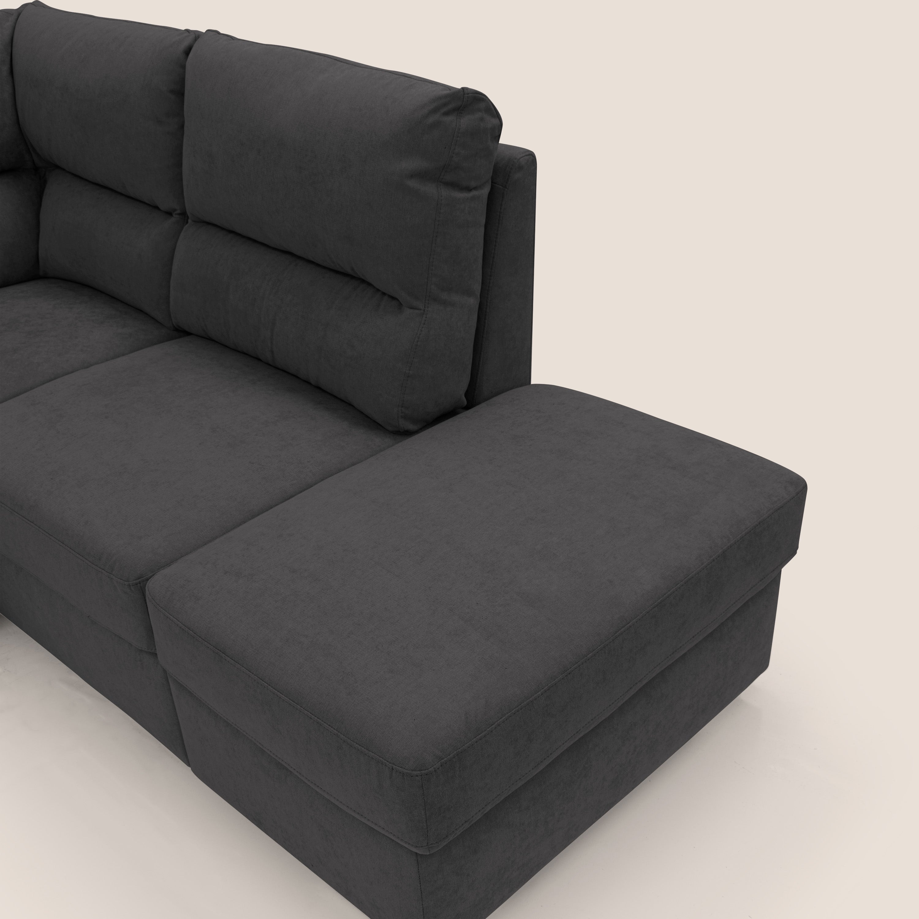 Minerva divano angolare con estraibile a cassettone e pouf contenitore in tessuto morbido impermeabile T02 nero - divitt.sbs