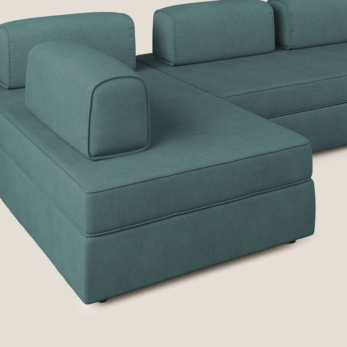 Liberty divano panoramico con pouf estraibile e schienali movibili in tessuto morbido impermeabile T02 petrolio - divitt.sbs