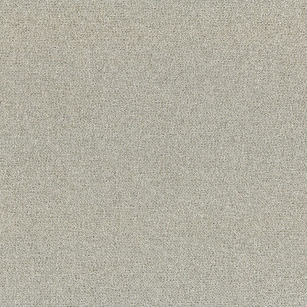 Un primo piano del tessuto “Personalizzazione” della linea T25 DAKAR, caratterizzato da una tonalità beige neutra con una trama fine e uniforme e da un delicato motivo screziato composto da macchie chiare e scure distribuite su tutta la superficie.