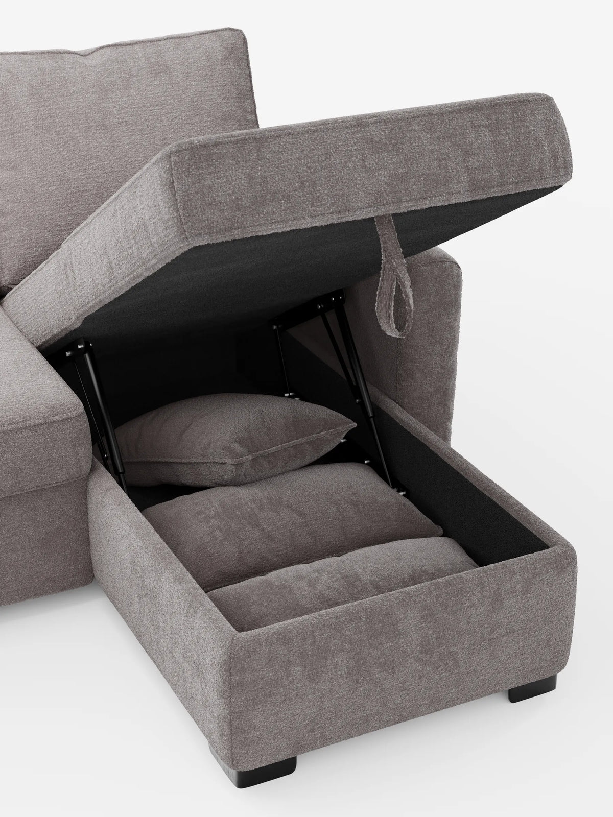 Divano letto Ottaviano in tessuto grigio con letto estraibile - penisola reversibile e contenitore in tessuto materico smacchiabile, dotato di vano portaoggetti aperto sotto la chaise longue con due cuscini, struttura nera e cinghia di sollevamento in tessuto.