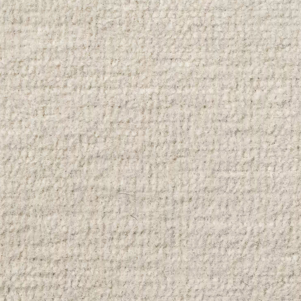 Un primo piano del tessuto intrecciato beige chiaro e dalla trama ruvida utilizzato per la personalizzazione del modello T31 BOLERO, caratterizzato da un motivo fitto e irregolare di fili color crema e grigio chiaro intrecciati tra loro.