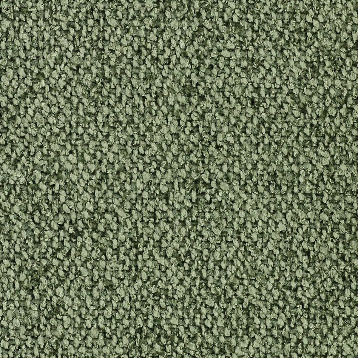 Primo piano del cuscino Lambada di divitt.sbs in verde strutturato, caratterizzato da asole fitte e arrotondate nei toni del verde che ricordano la morbidezza del cotone. Realizzato in tessuto T33 smacchiabile e impermeabile, disponibile in vari colori.