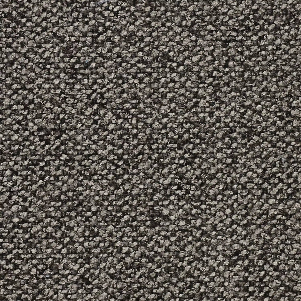Primo piano del cuscino Lambada di divitt.sbs, disponibile in vari colori. Realizzato con un tessuto fresco e naturale simile al cotone, resistente alle macchie e all'acqua (T33), presenta una superficie strutturata e resistente per un comfort duraturo.