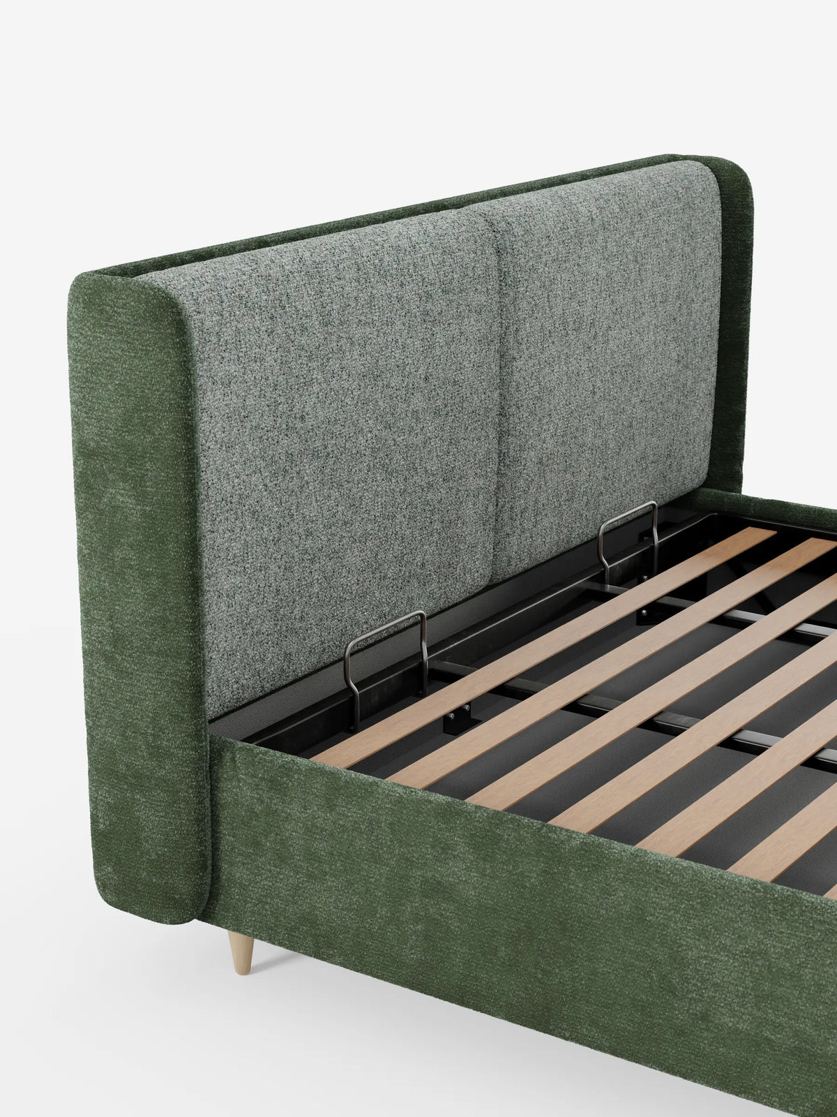 Il letto imbottito bicolore VALKIRIA con contenitore è un letto moderno caratterizzato da una testiera alta e ricurva, rivestita in verde scuro e grigio chiaro, da doghe in legno che sovrastano un vano contenitore e da gambe cilindriche chiare su uno sfondo bianco.