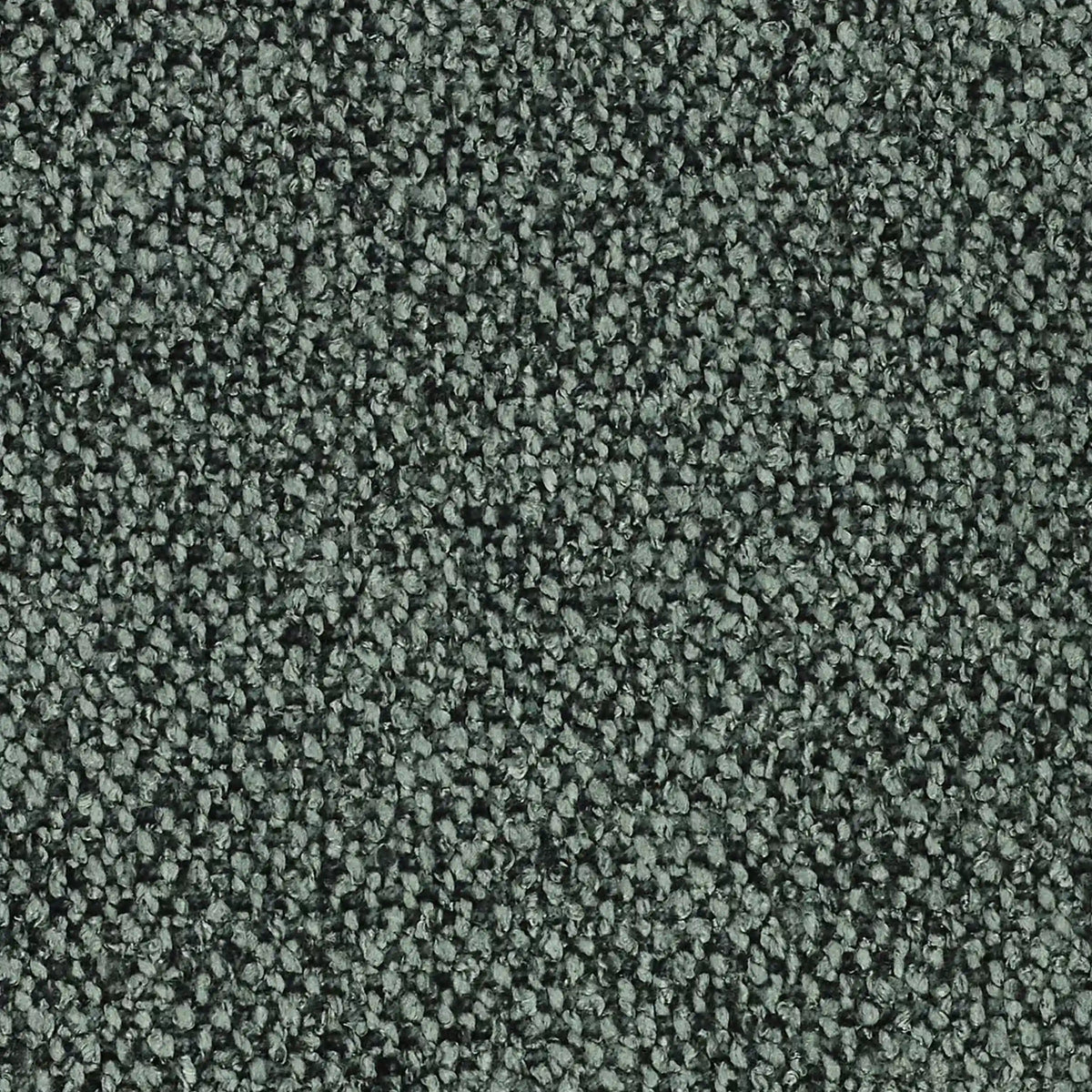 Primo piano del cuscino Lambada di divitt.sbs: disponibile in vari colori, è realizzato in un tessuto fresco e naturale simile al cotone, resistente alle macchie e all'acqua. La superficie è uniformemente strutturata, con un aspetto morbido e ammortizzato.
